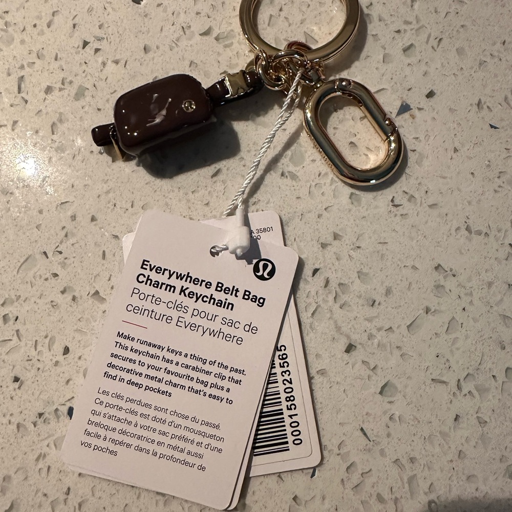 NWT lululemon athletica Everywhere Belt Bag Charm Keychain - Brown and Gold
